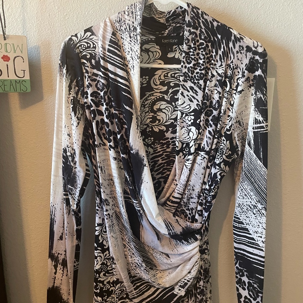 This is beautiful on. Stretchy fit.  Very flattering.